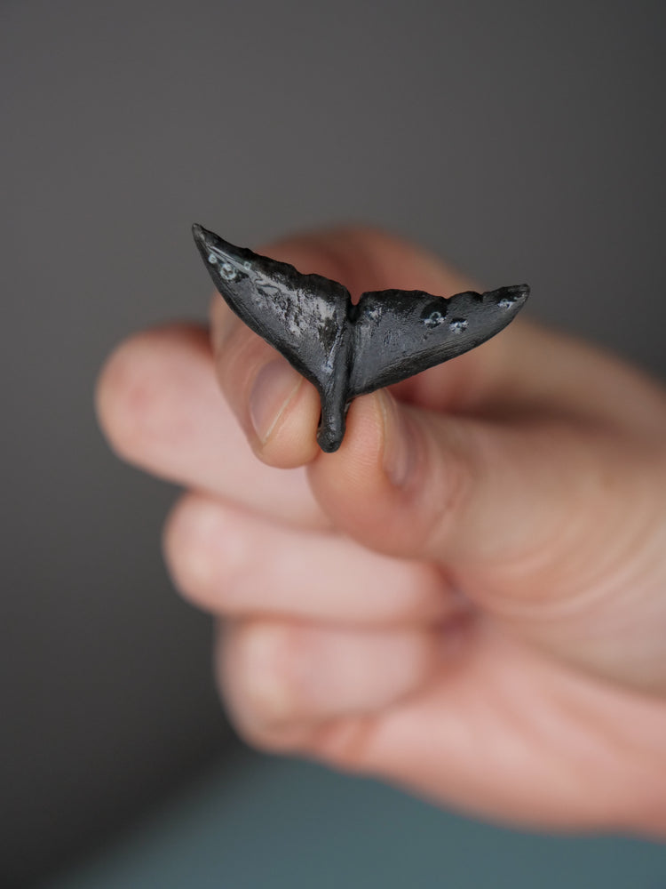 Whale tail pendants