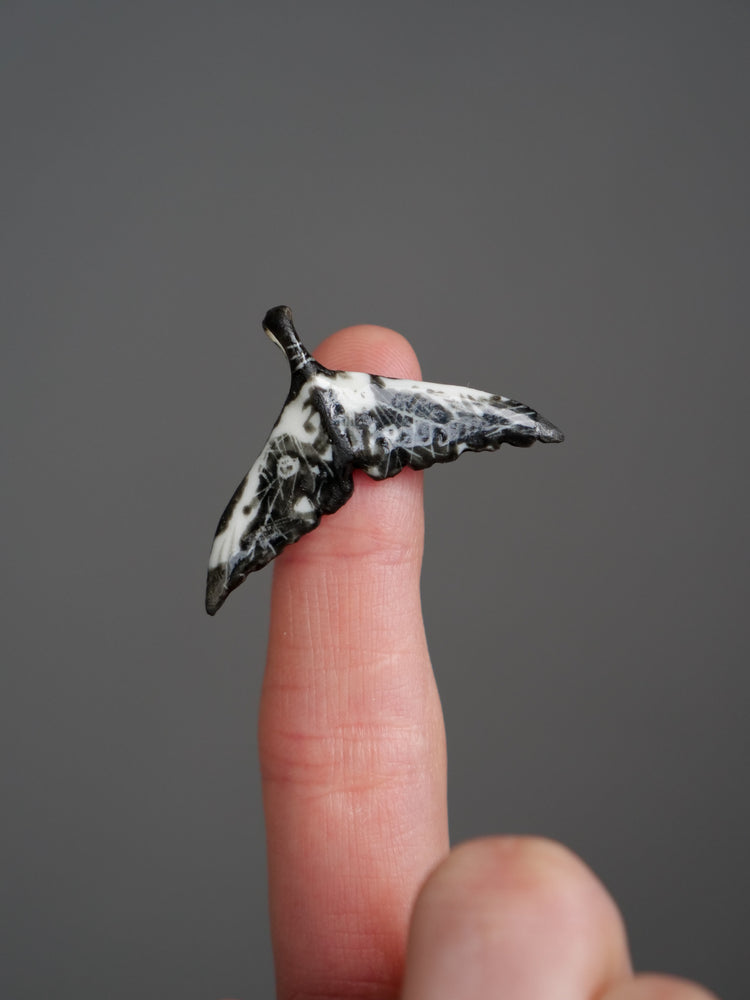Porcelain whale tail pendants