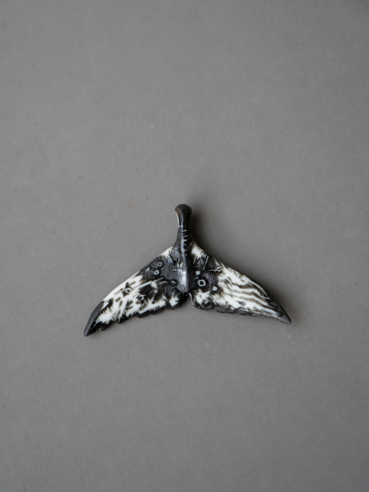 Porcelain whale tail pendants