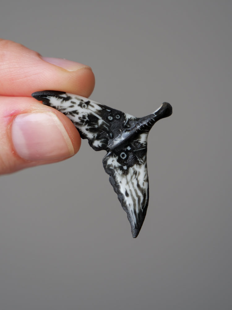 Porcelain whale tail pendants