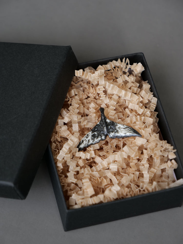 Porcelain whale tail pendants