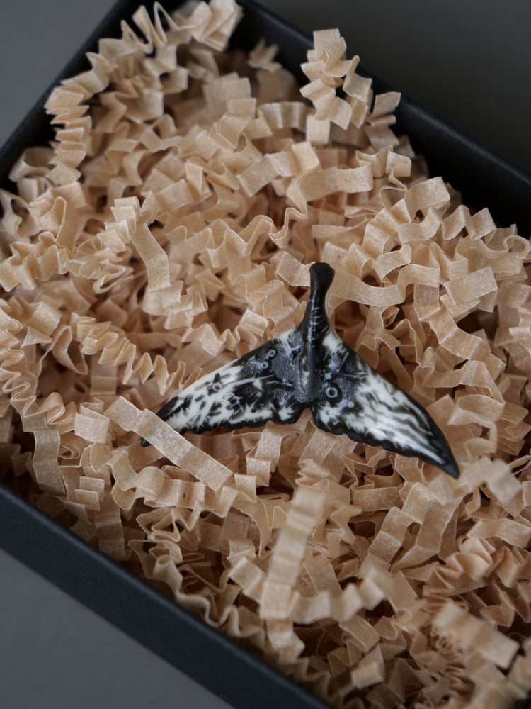 Porcelain whale tail pendants
