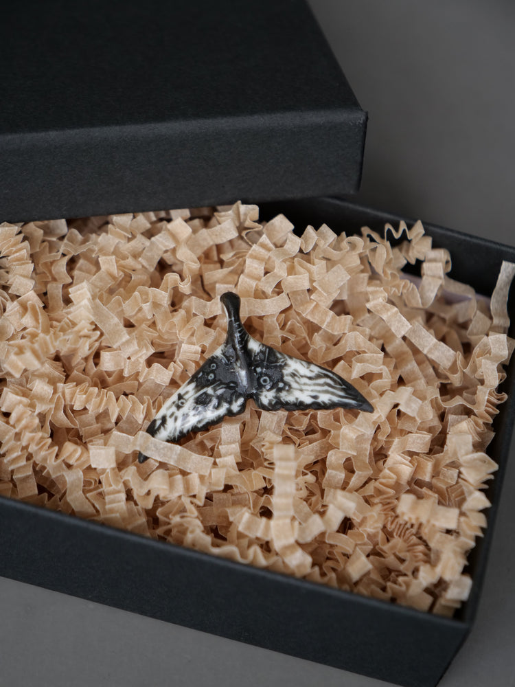 Porcelain whale tail pendants