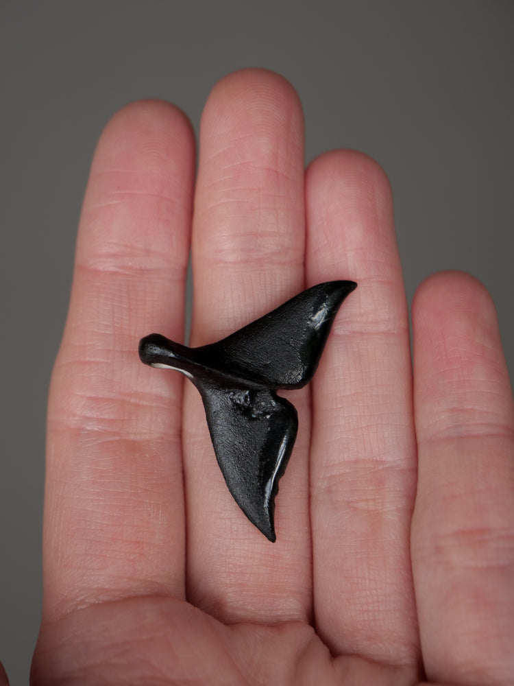 Porcelain whale tail pendants