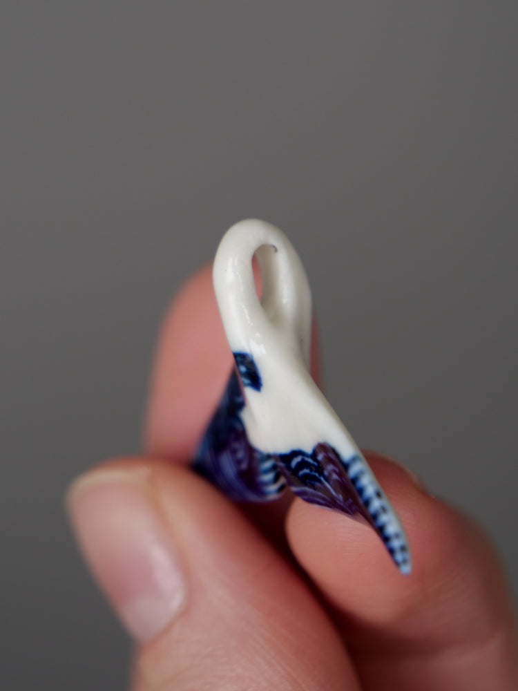 Porcelain whale tail pendants