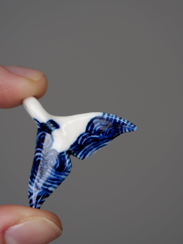 Porcelain whale tail pendants