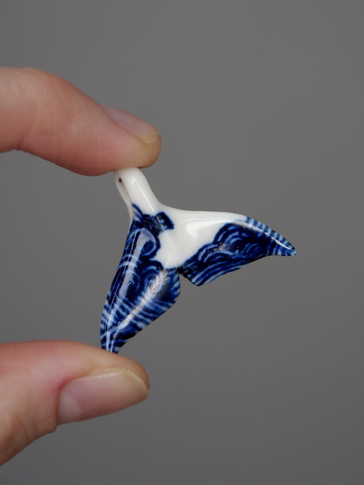 Porcelain whale tail pendants