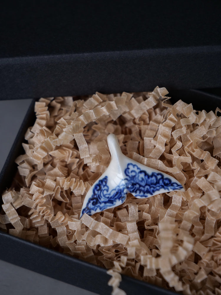 Porcelain whale tail pendants