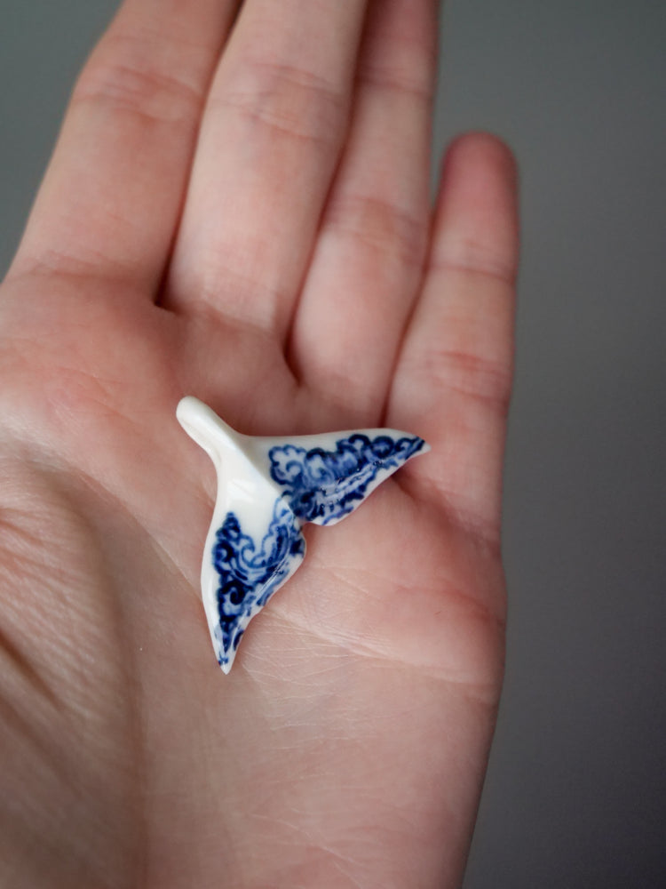 Porcelain whale tail pendants