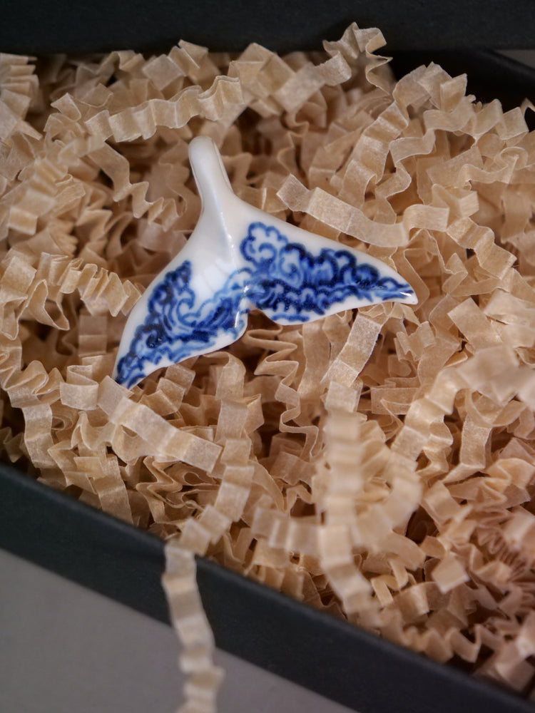 Porcelain whale tail pendants