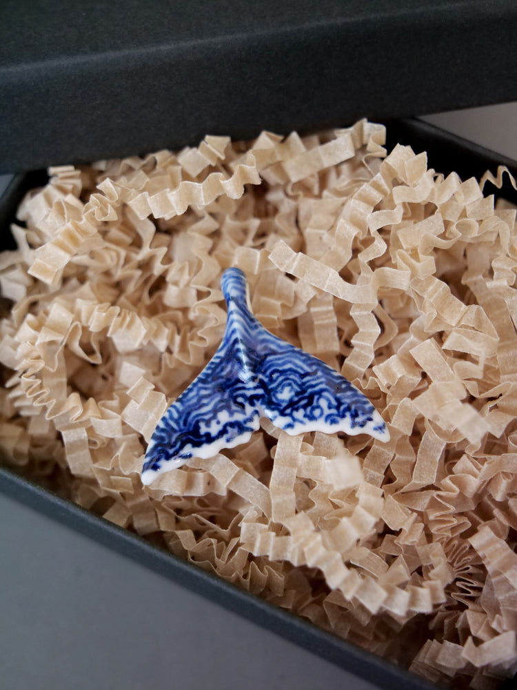Porcelain whale tail pendants