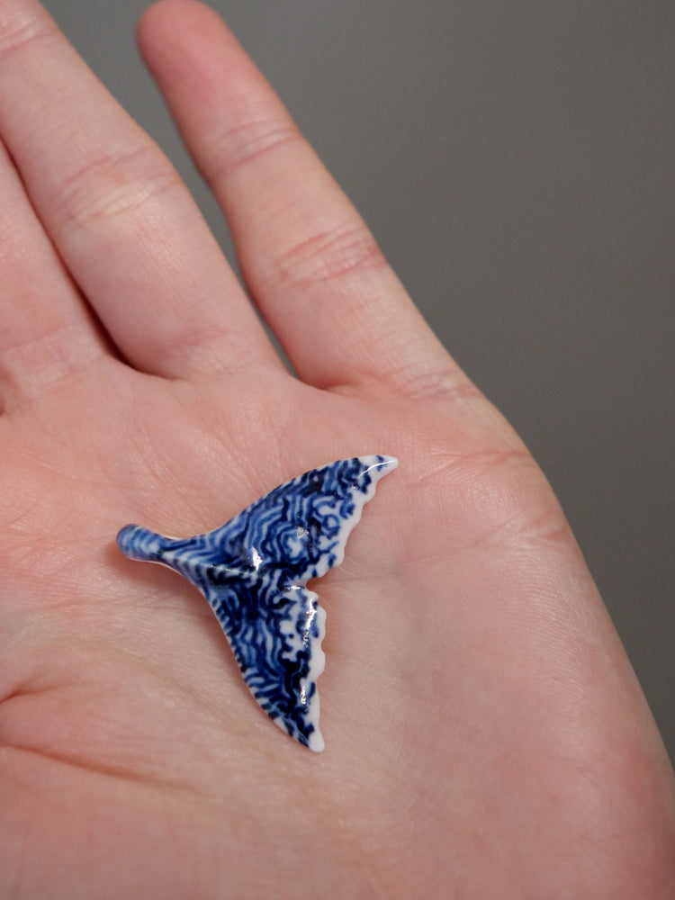 Porcelain whale tail pendants