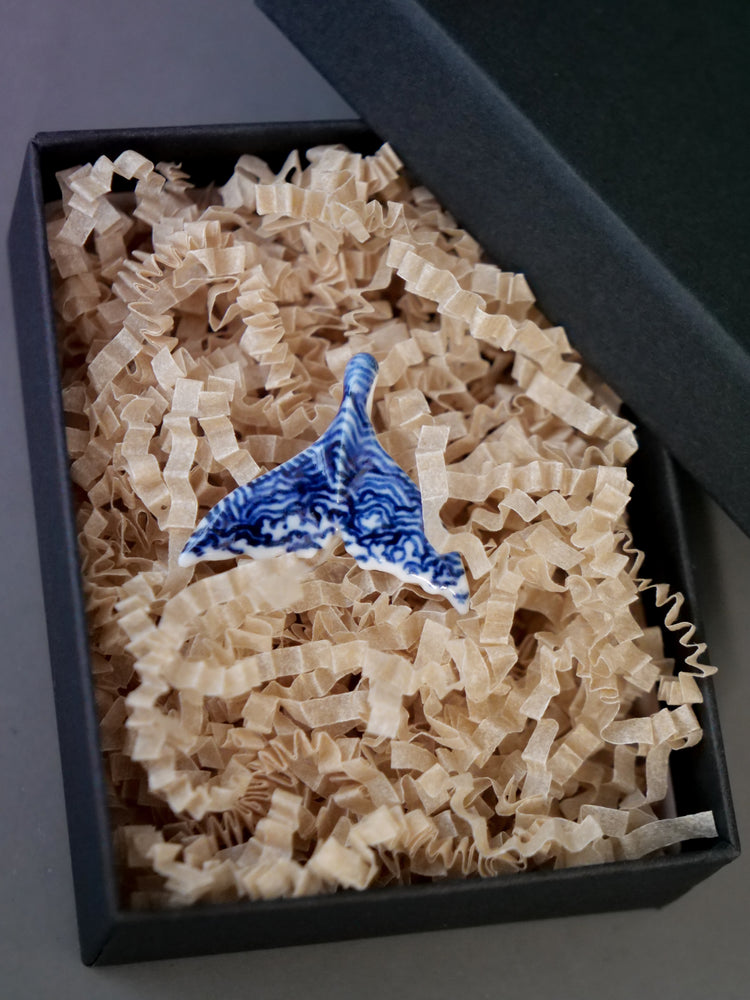 Porcelain whale tail pendants