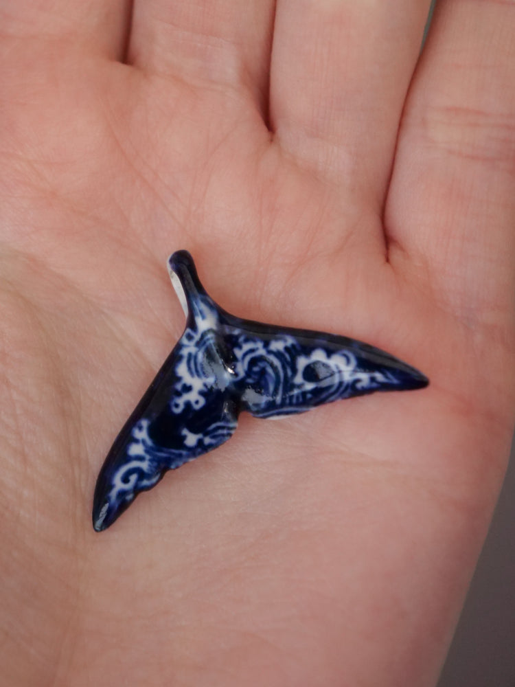 Porcelain whale tail pendants