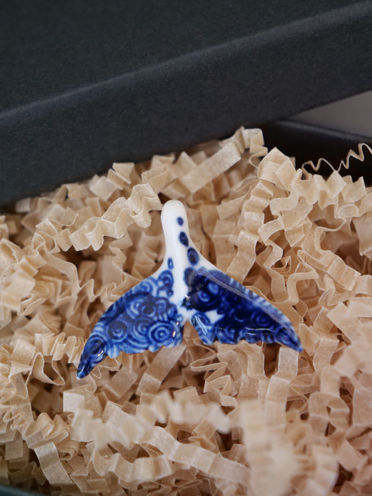 Porcelain whale tail pendants