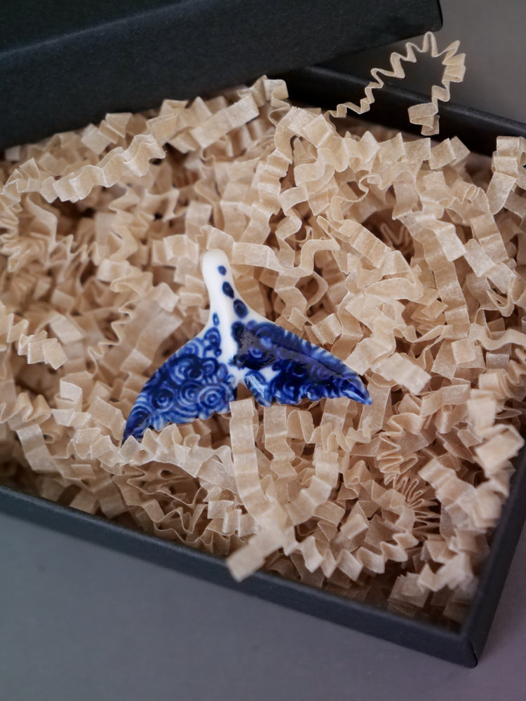 Porcelain whale tail pendants