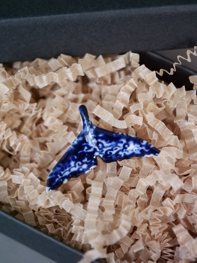 Porcelain whale tail pendants