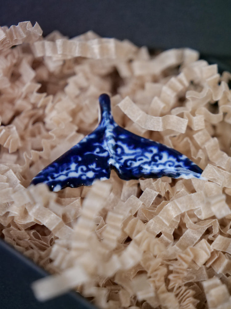 Porcelain whale tail pendants
