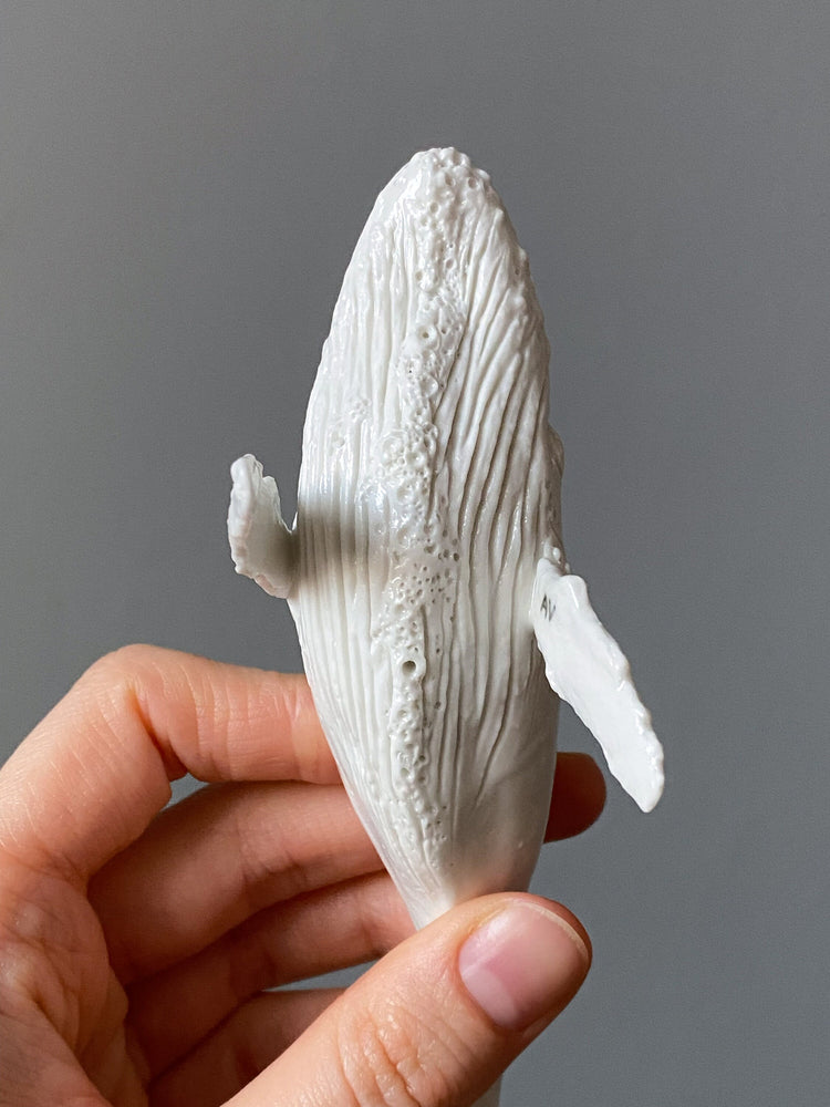 Many – Porcelain whale sculpture