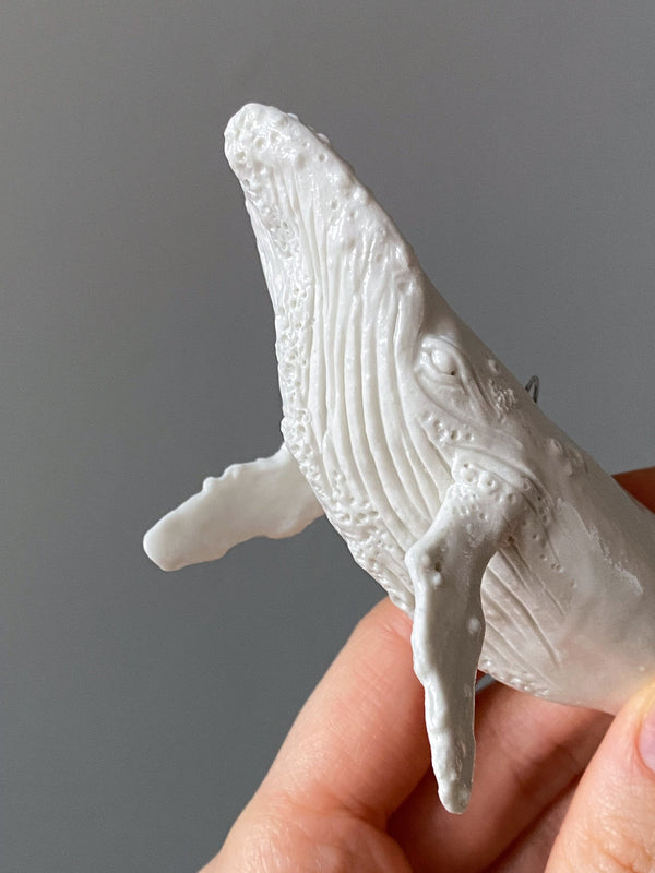 Many – Porcelain whale sculpture