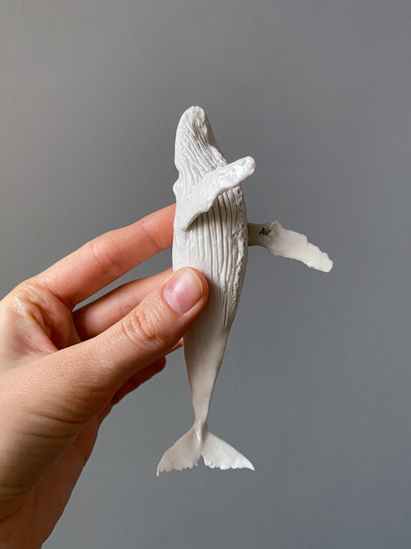 Many – Porcelain whale sculpture
