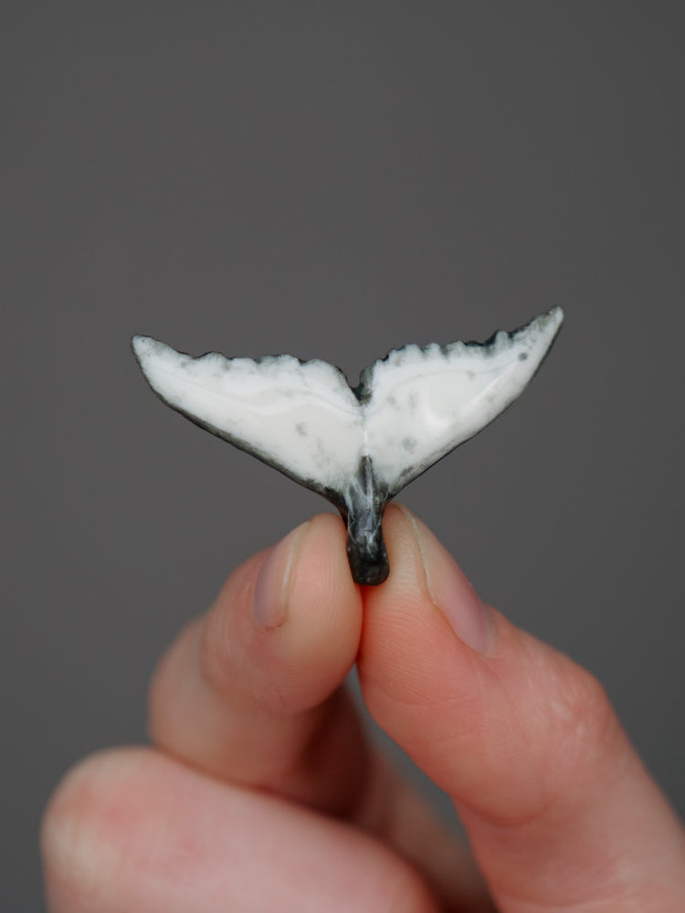 Whale tail pendants