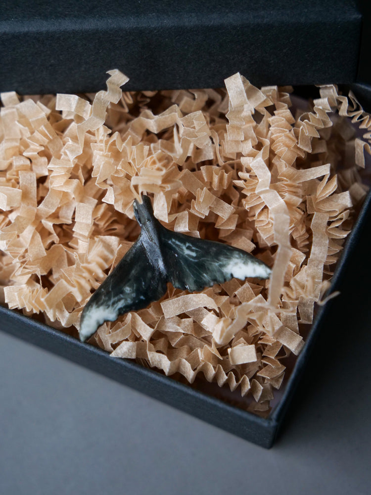 Whale tail pendants