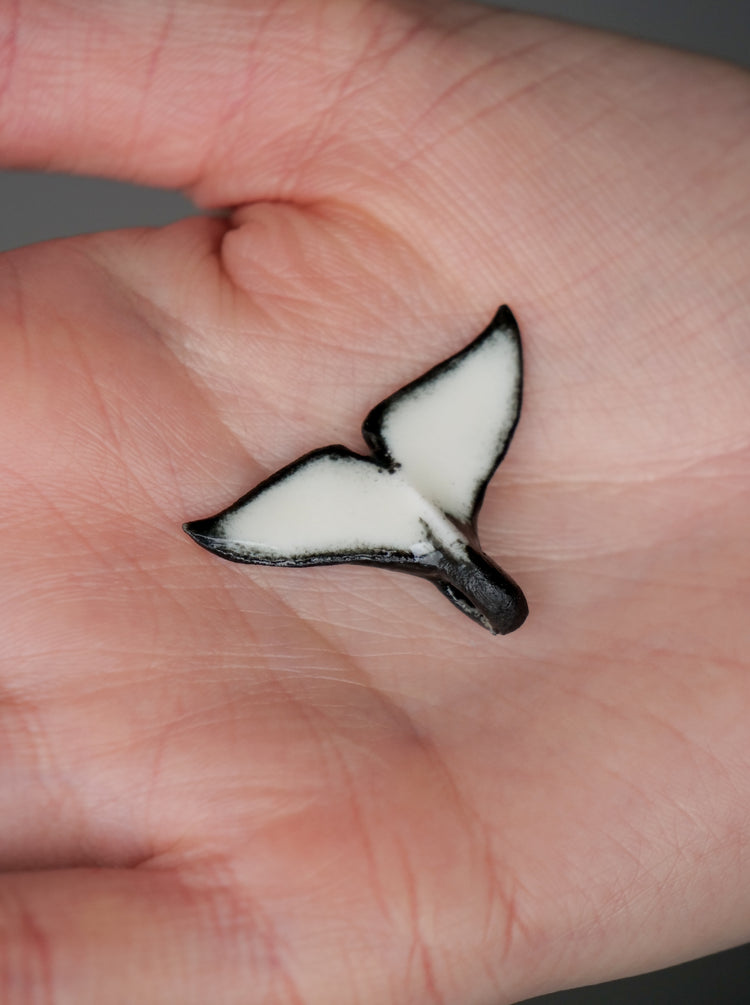 Whale tail pendants
