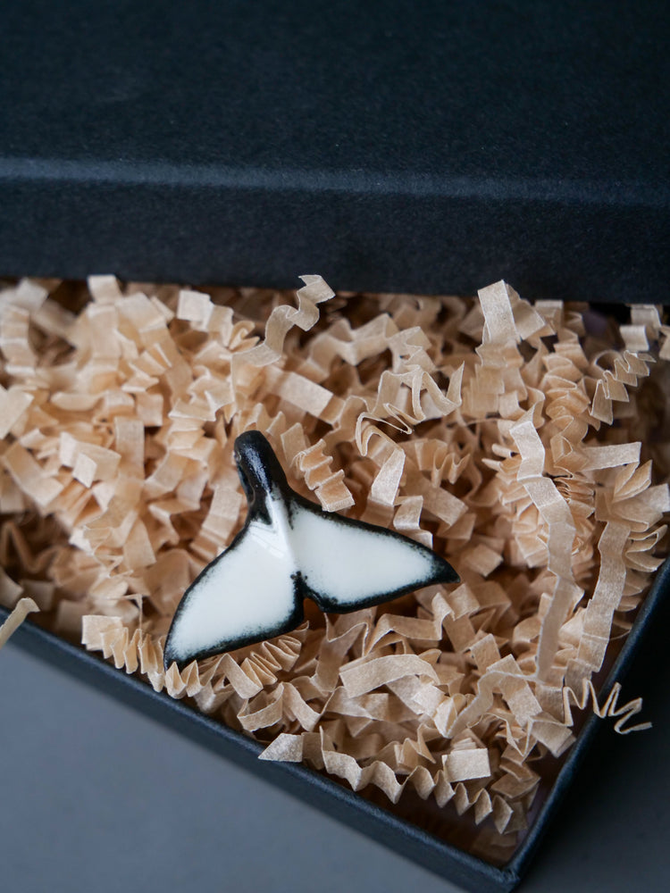 Whale tail pendants