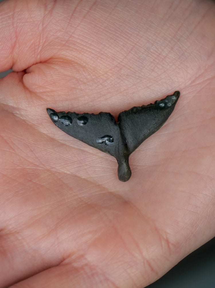 Whale tail pendants
