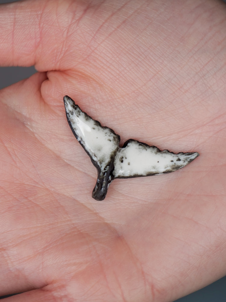 Whale tail pendants