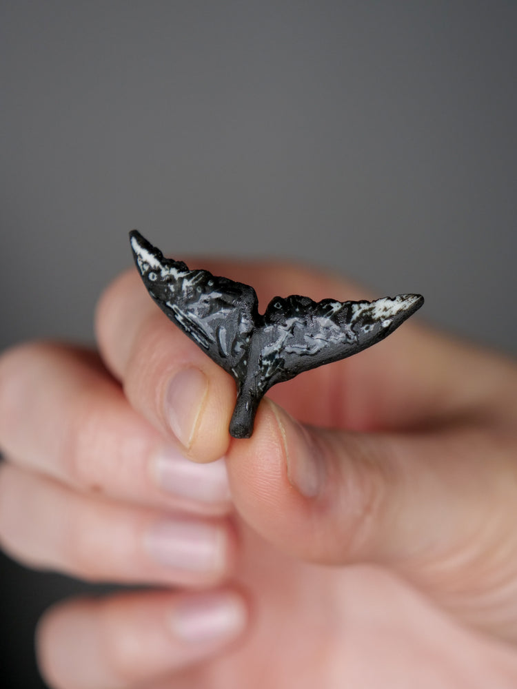 Whale tail pendants