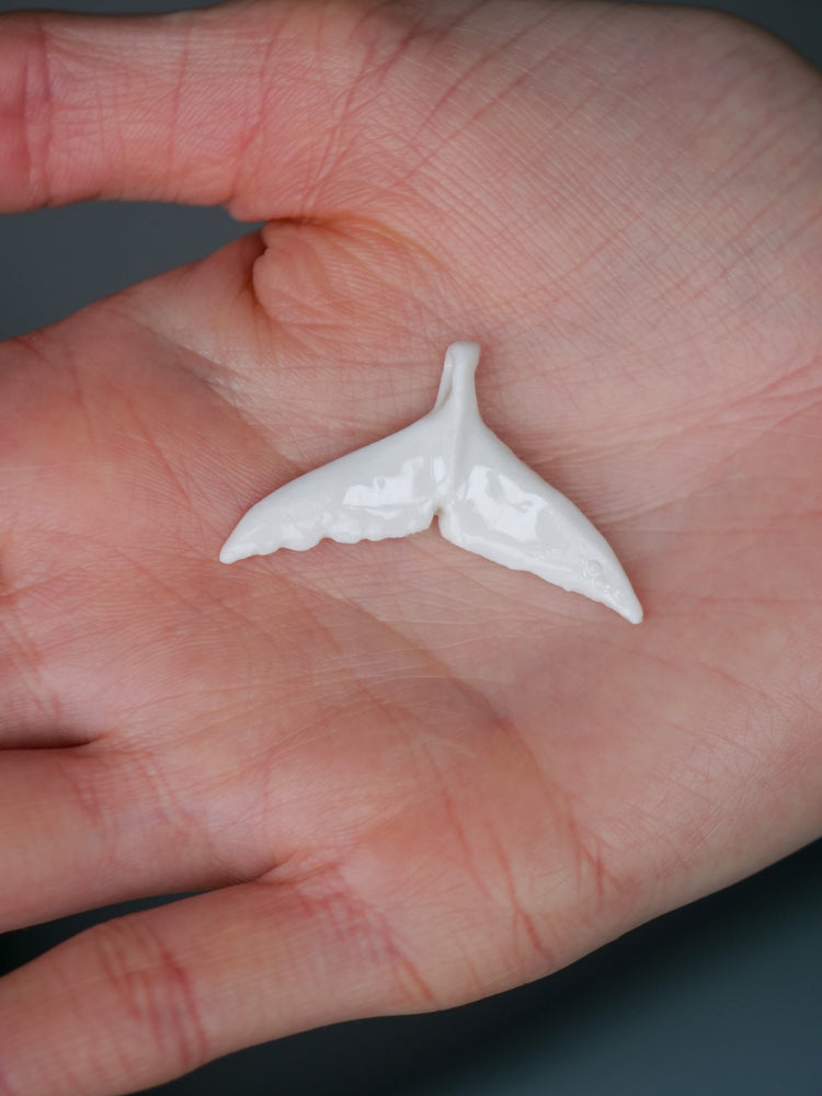 Whale tail pendants