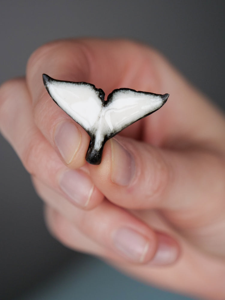 Whale tail pendants