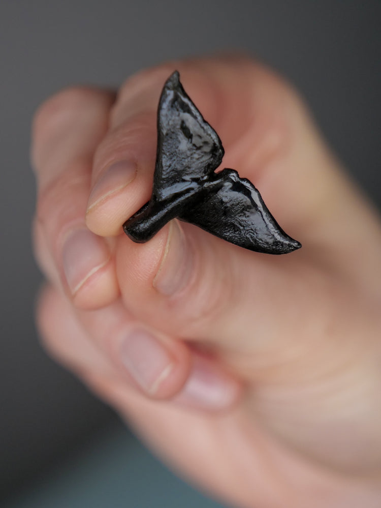 Whale tail pendants