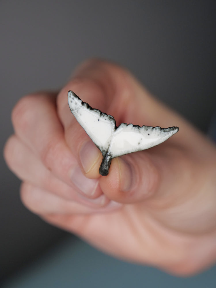 Whale tail pendants