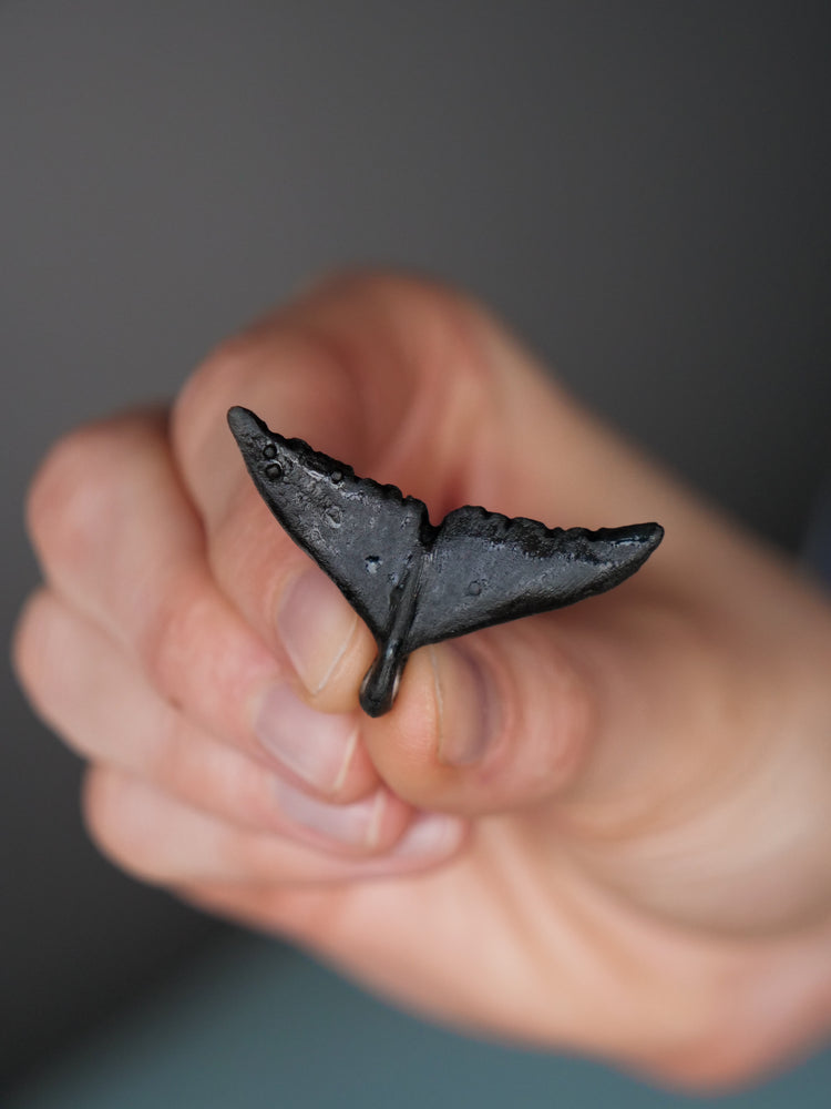 Whale tail pendants