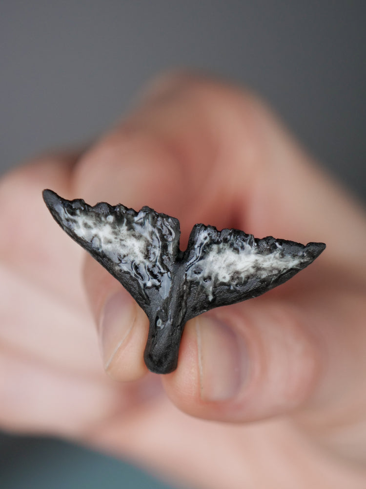 Whale tail pendants
