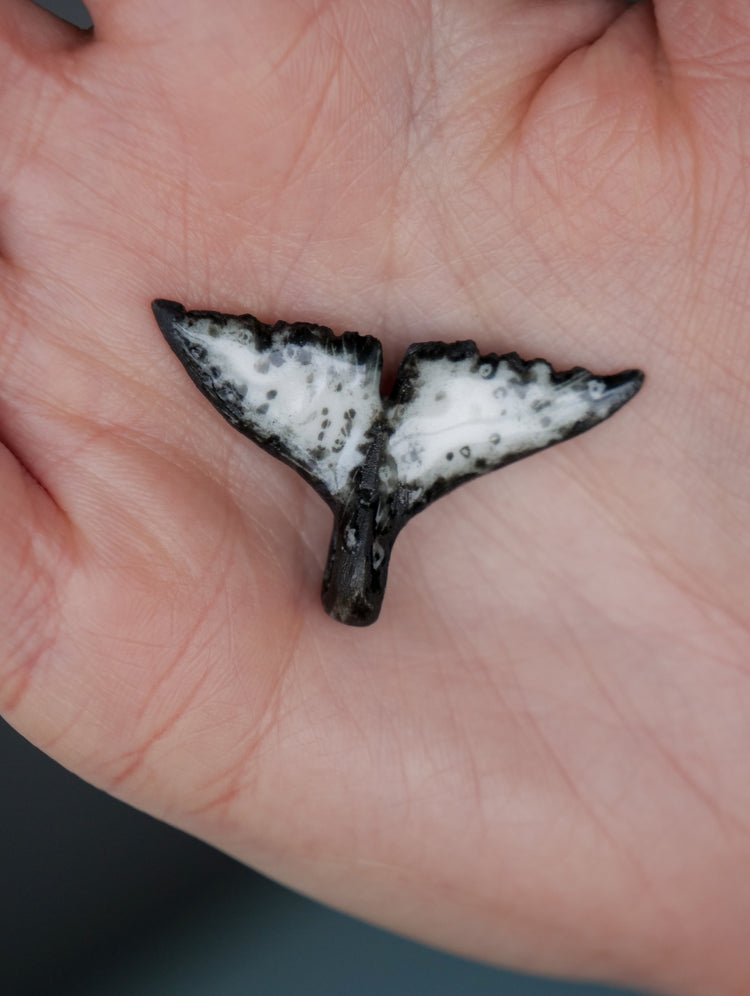 Whale tail pendants
