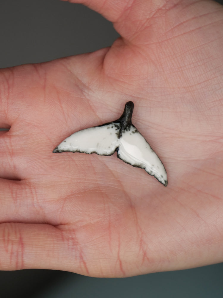 Whale tail pendants