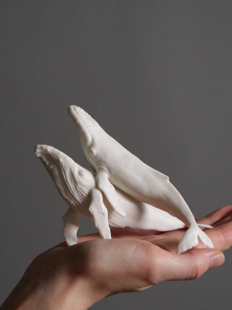 Dancing porcelain whales