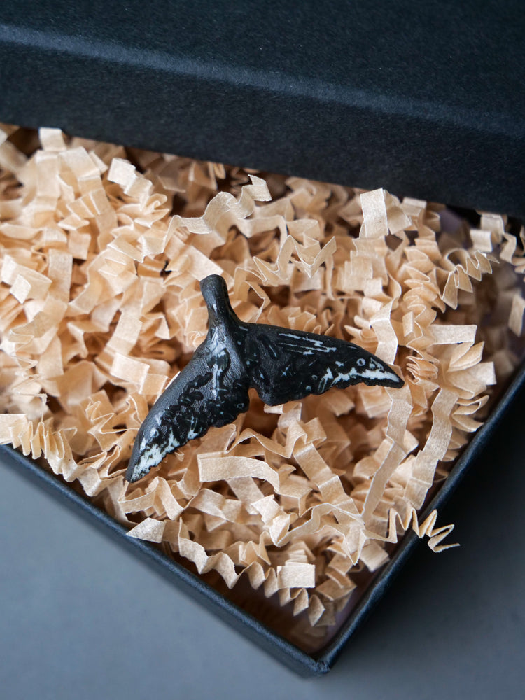 Whale tail pendants