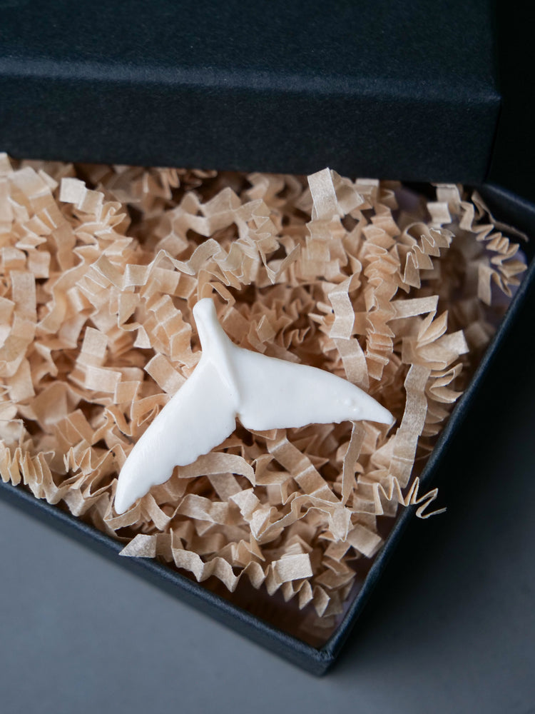 Whale tail pendants