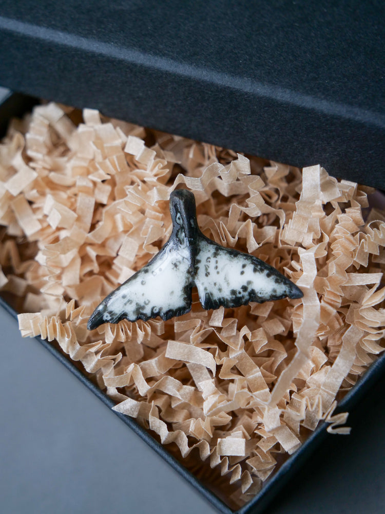 Whale tail pendants