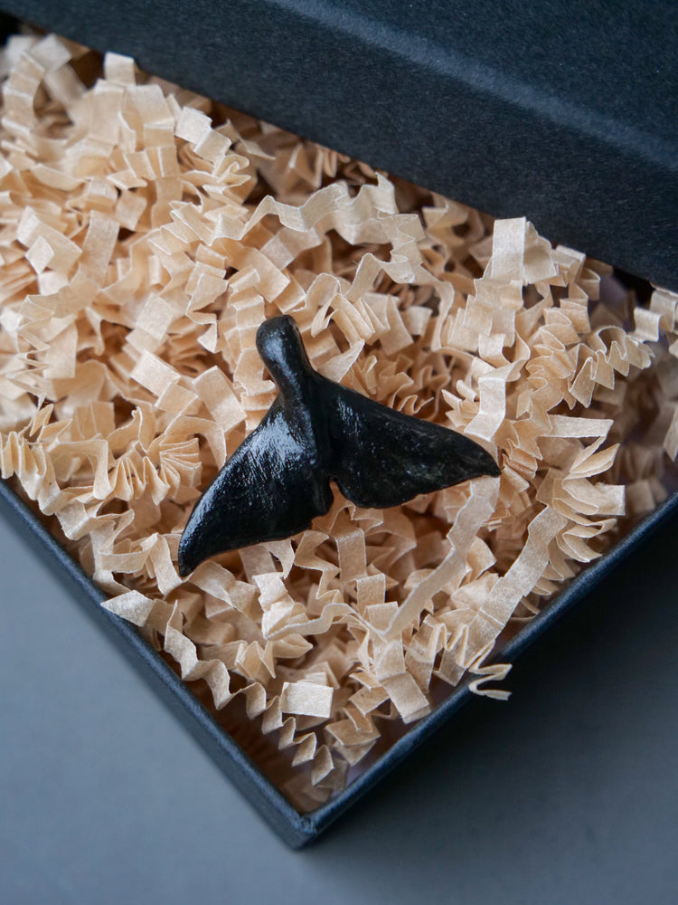 Whale tail pendants