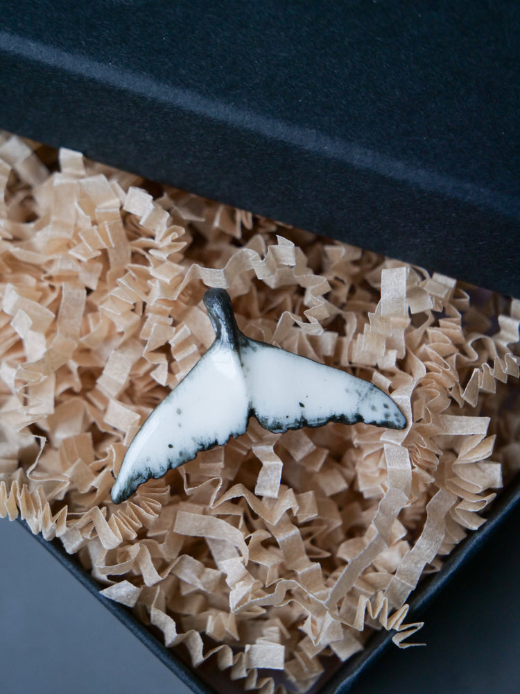 Whale tail pendants