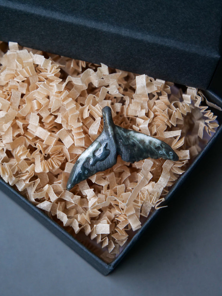Whale tail pendants
