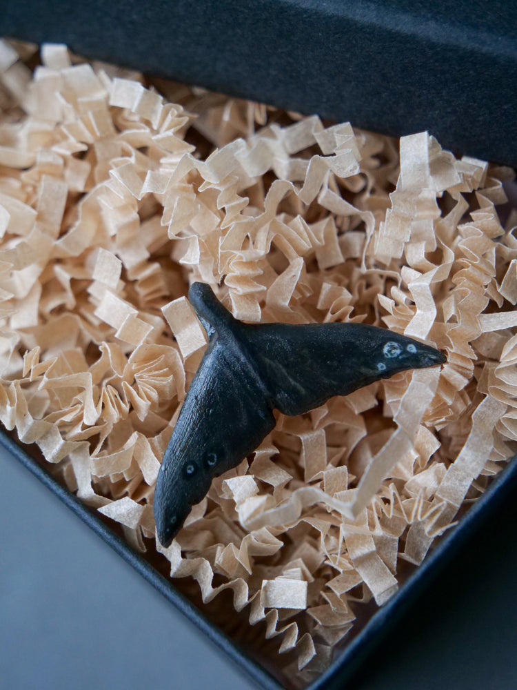 Whale tail pendants