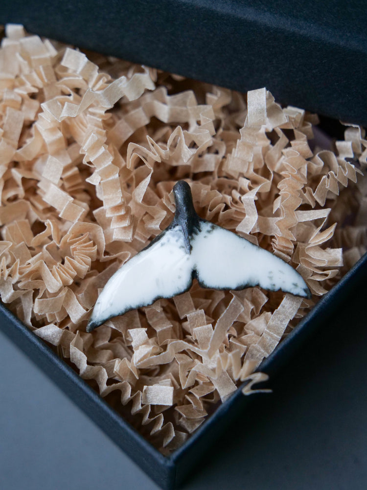 Whale tail pendants