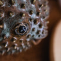 Blowfish made of ceramics, sea creature of sphere shape, coastal style interior decor with cute face, ocean sculpture, globefish bronze